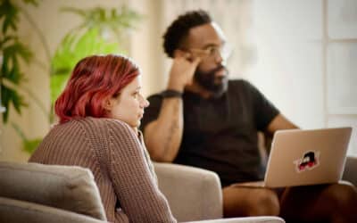 Employees listening during a meeting.